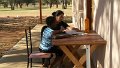 Sonia helping with homework